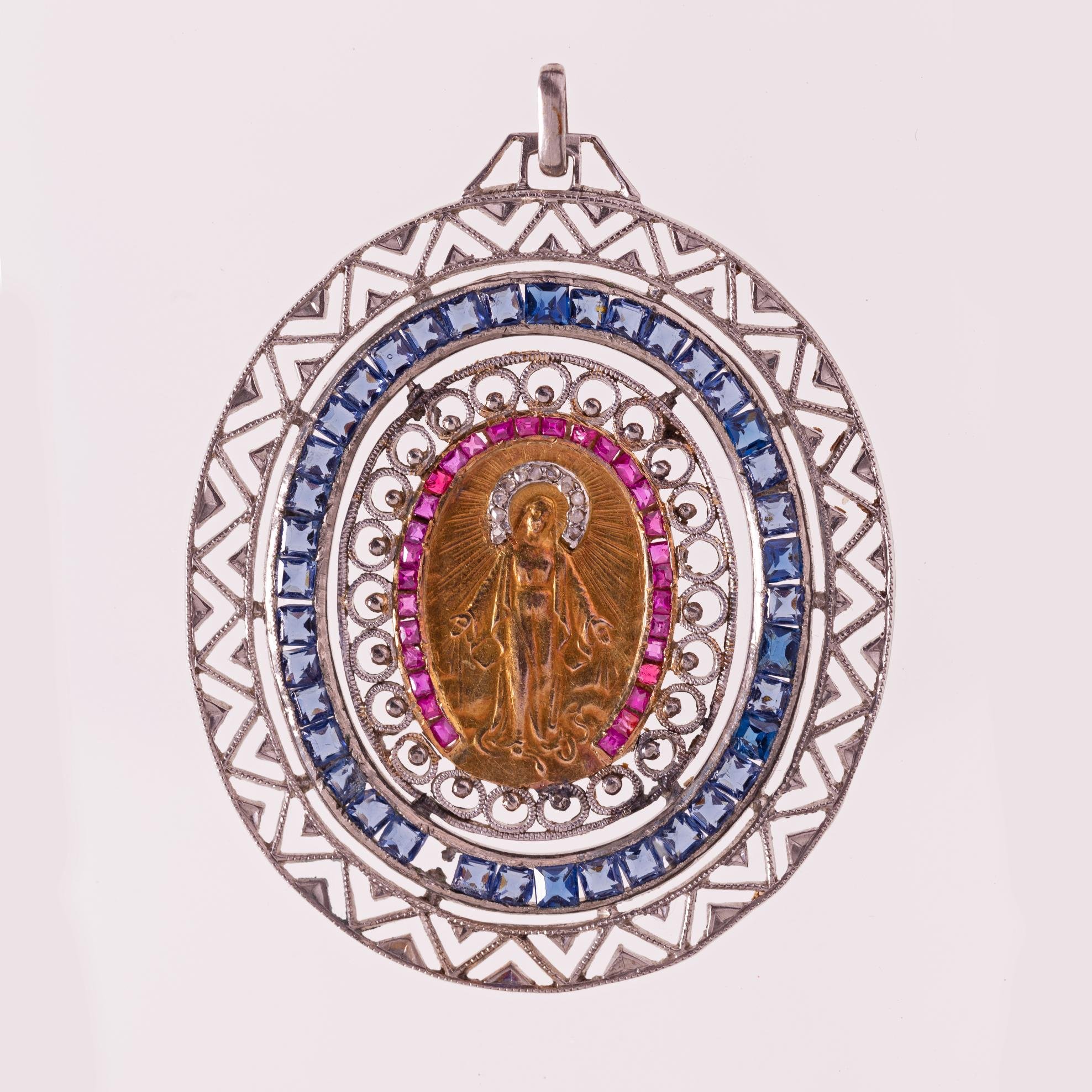 Colgante en platino, oro, rubíes y zafiros