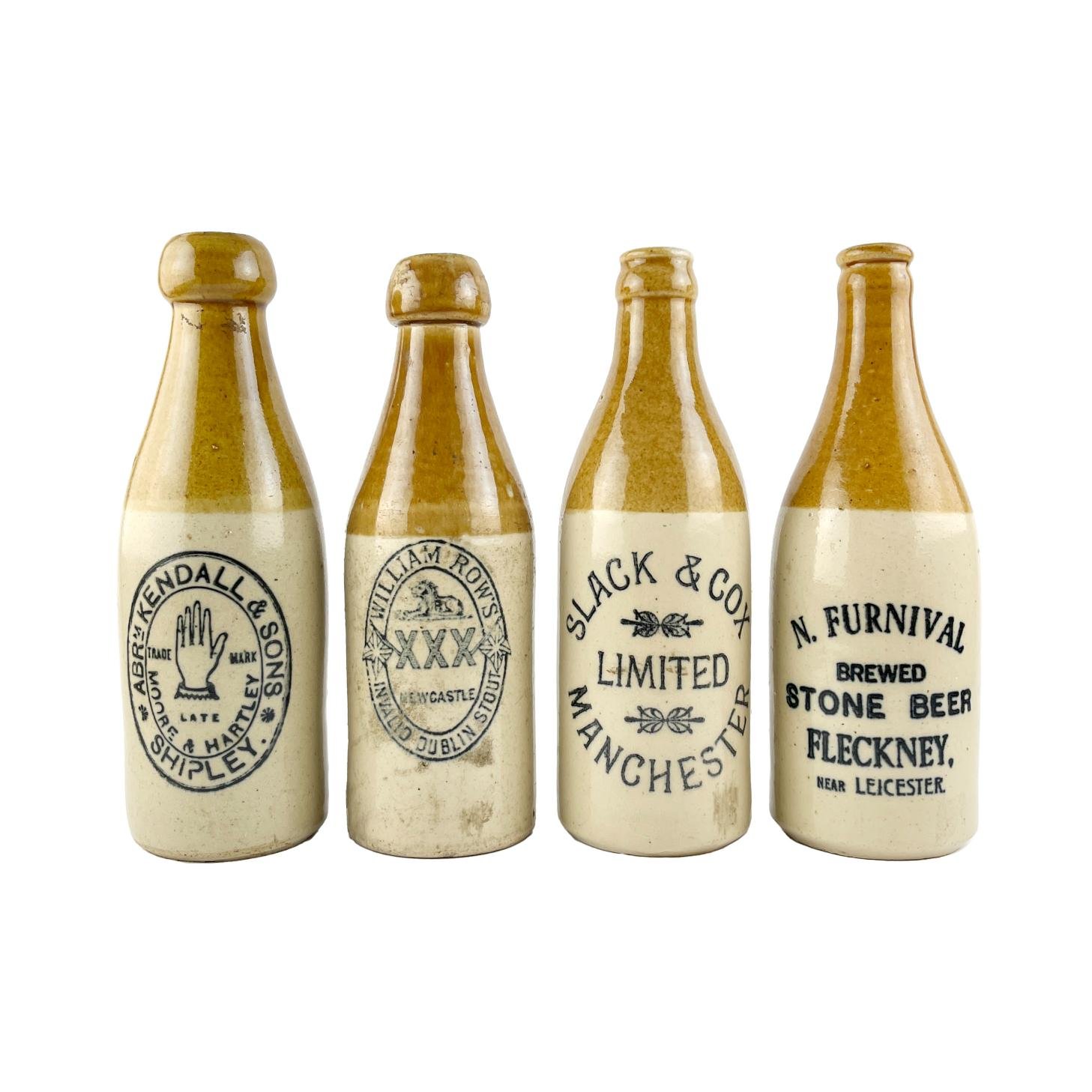 Cuatro botellas en gres