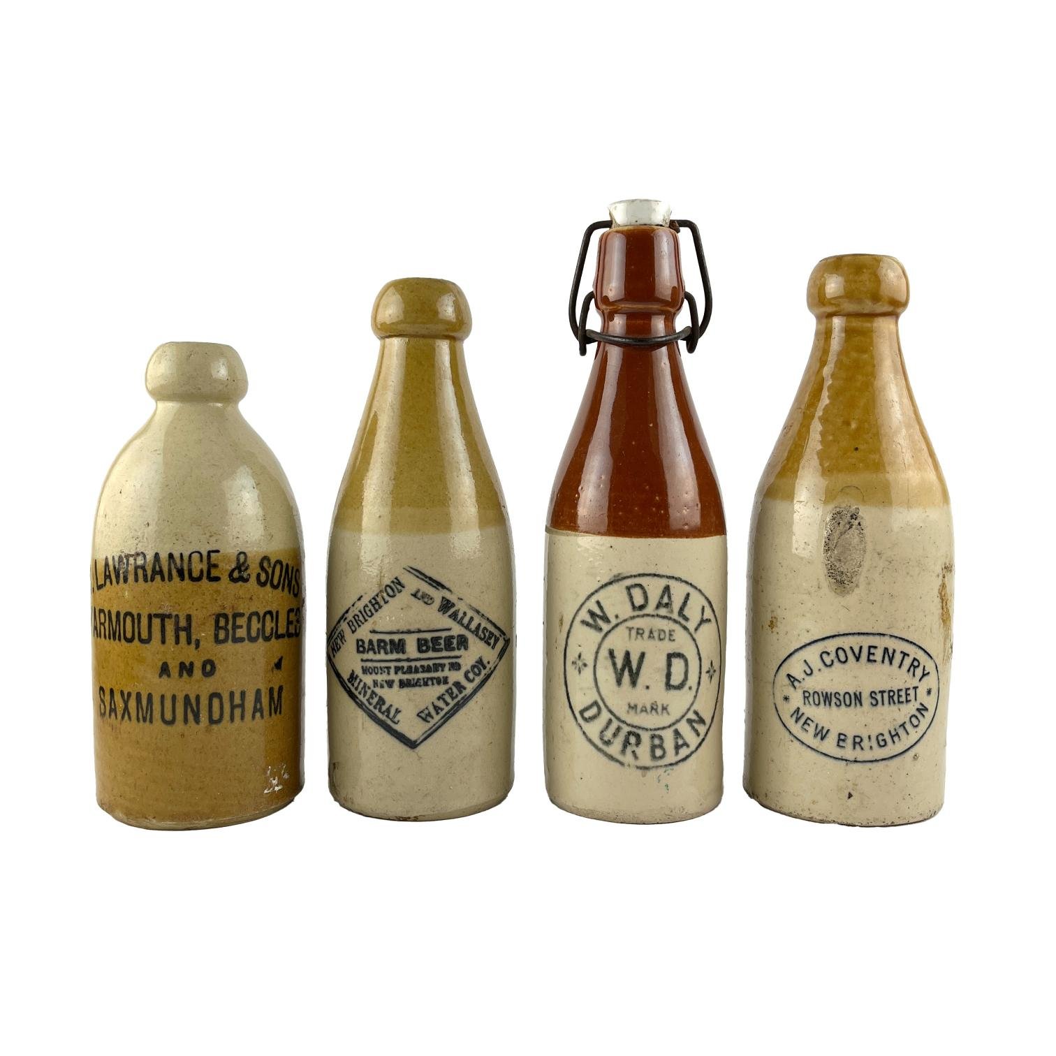 Cuatro botellas en gres