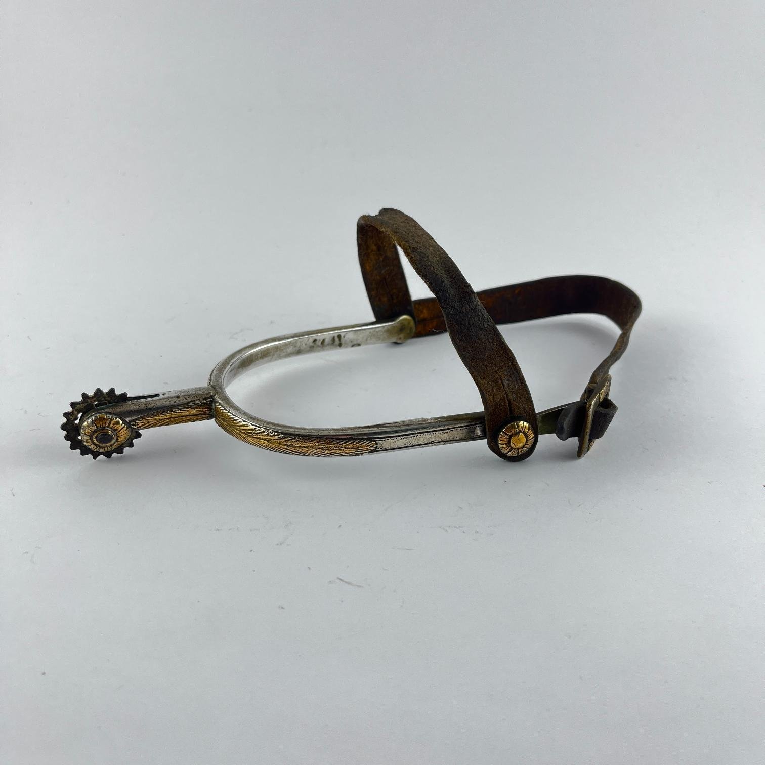 Espuelín en plata y oro