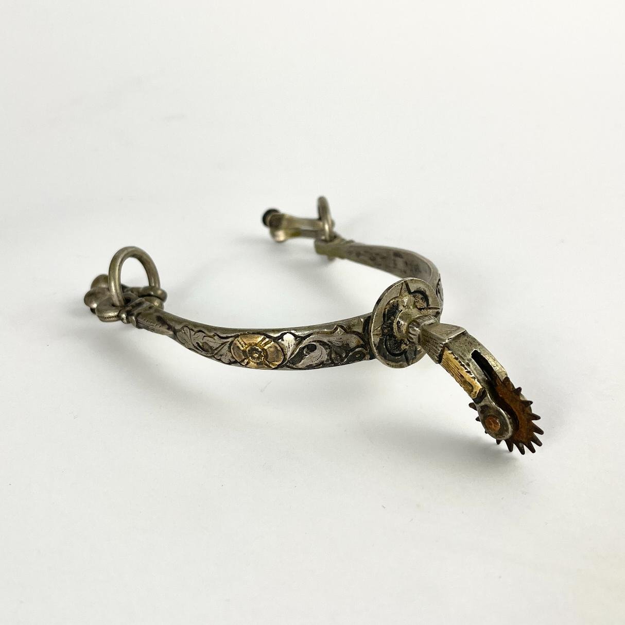 Espuelín en plata y oro