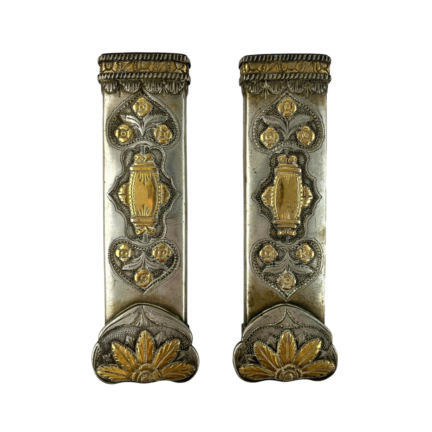 Par de pasadores en plata y oro