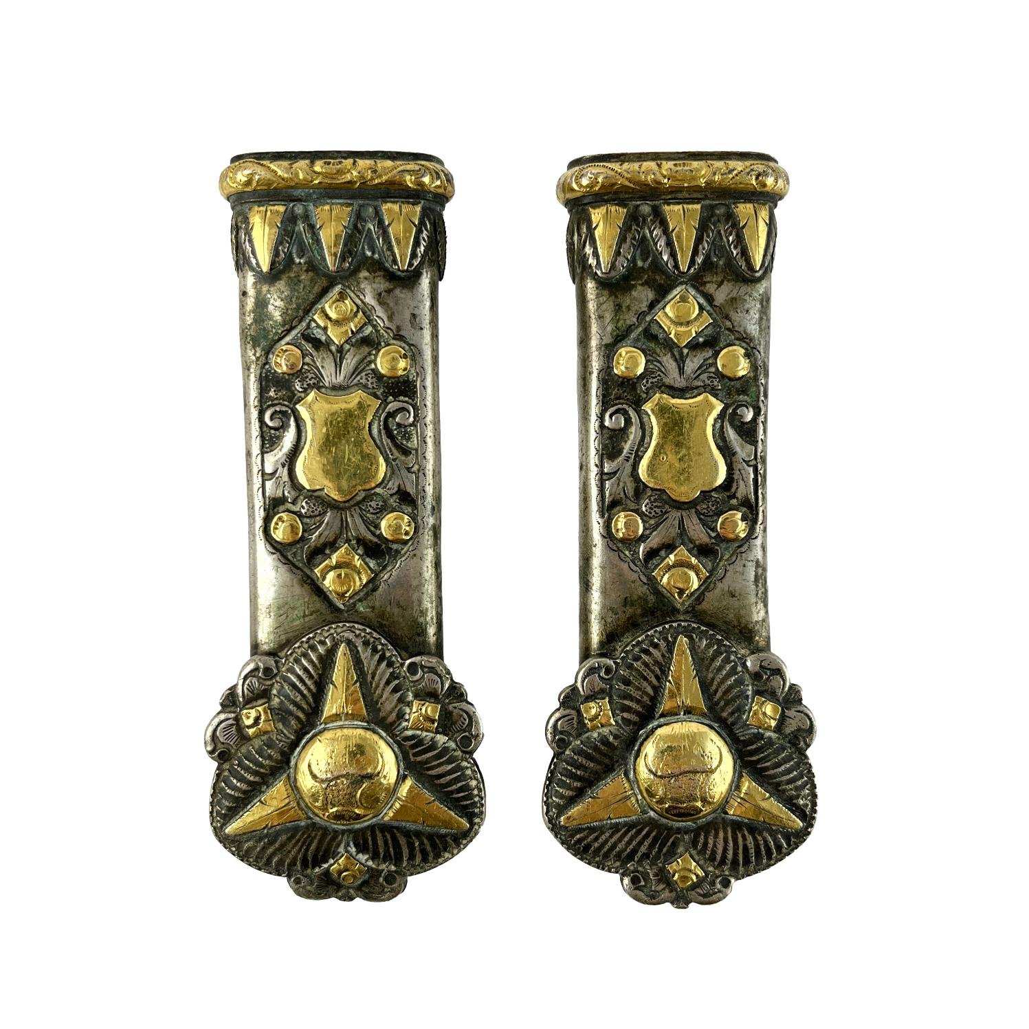 Par de pasadores en plata y oro