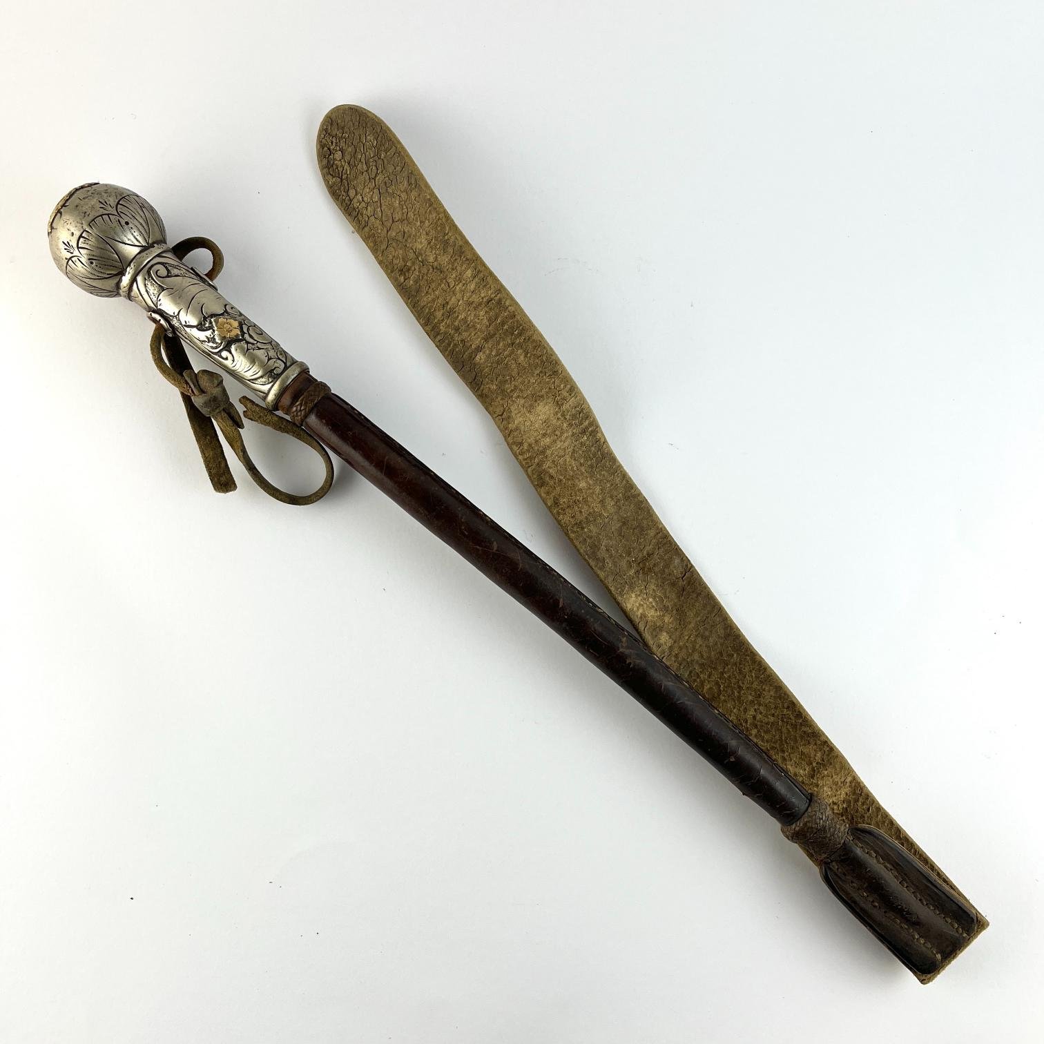 Rebenque en plata y oro