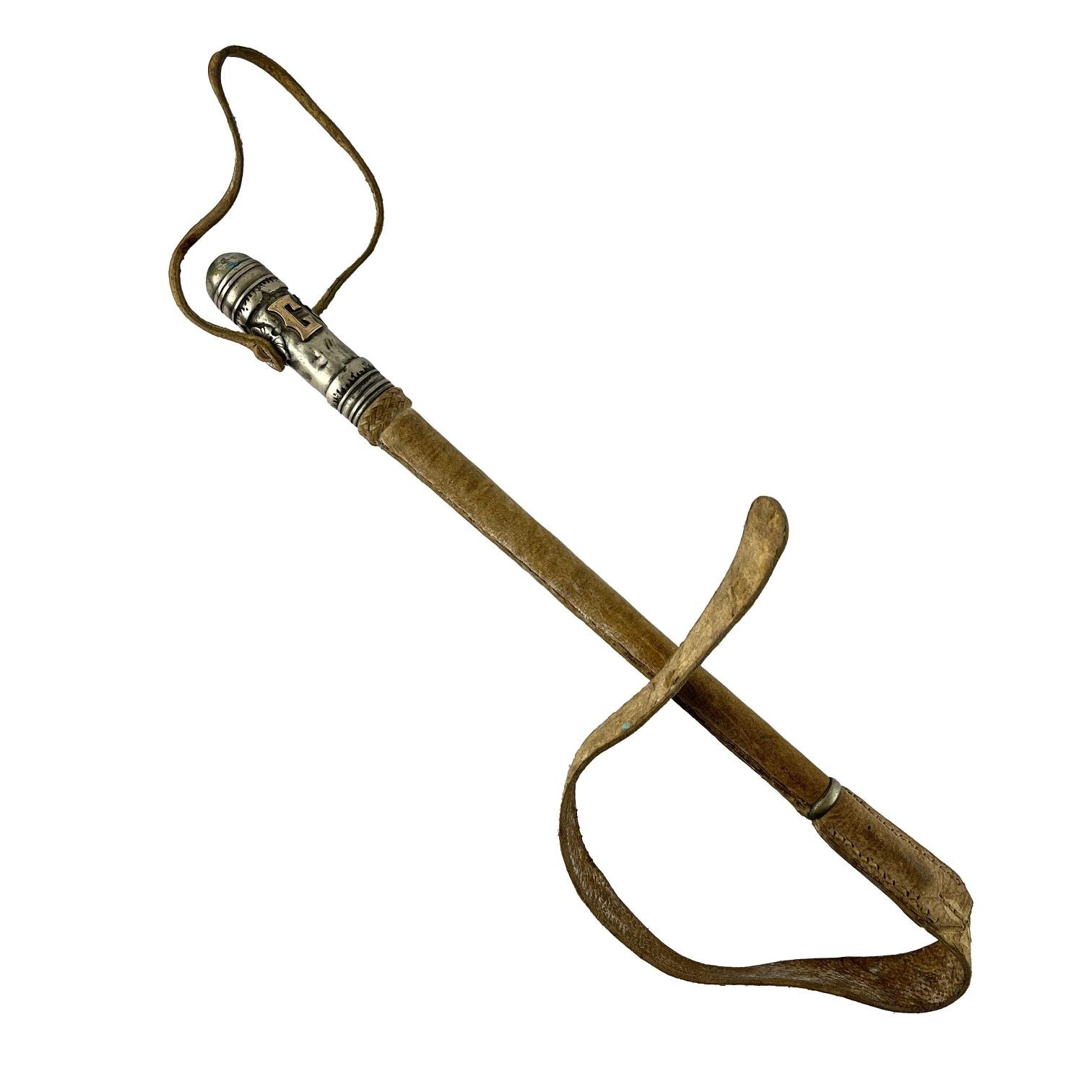 Rebenque argentino en plata y oro